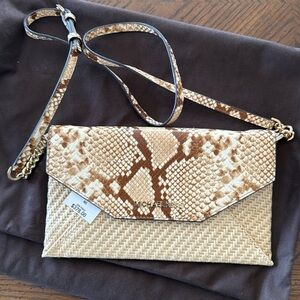 Michael Kors straw python capsule envelope clutch.
